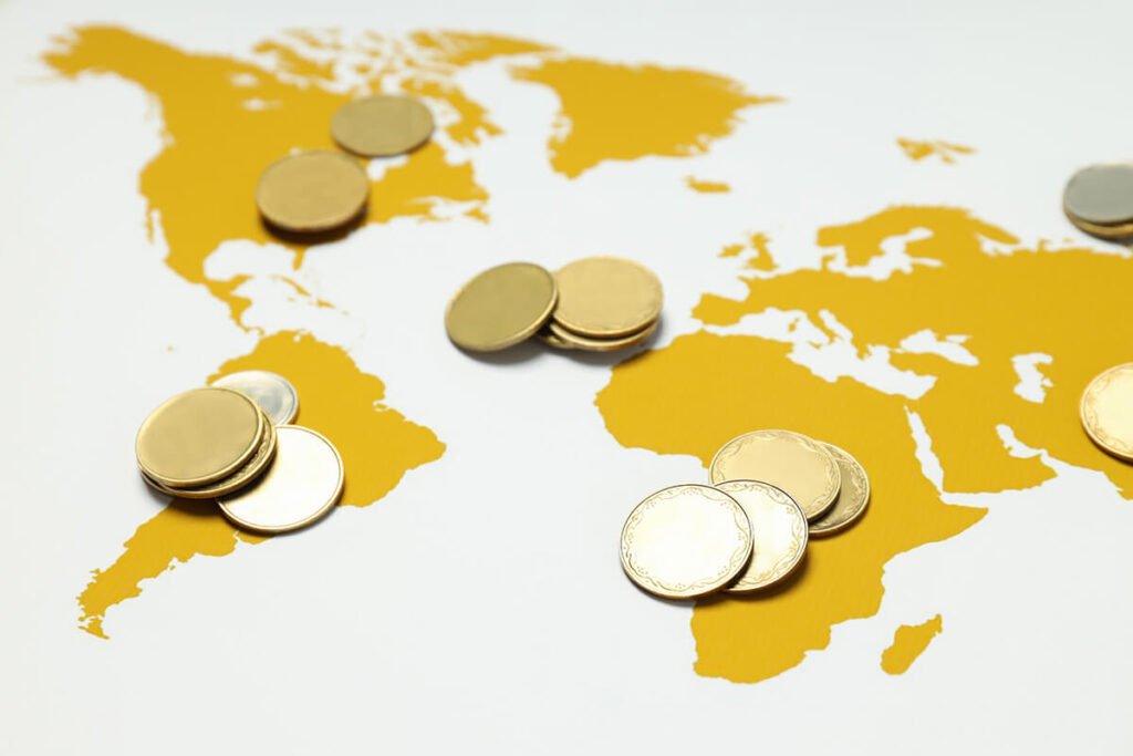 World map and financial icons representing the OECD G20 Inclusive Framework and global tax reform